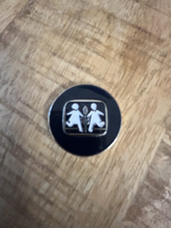 Indkøbsvogn mønt med SOS Børnebyerne logo