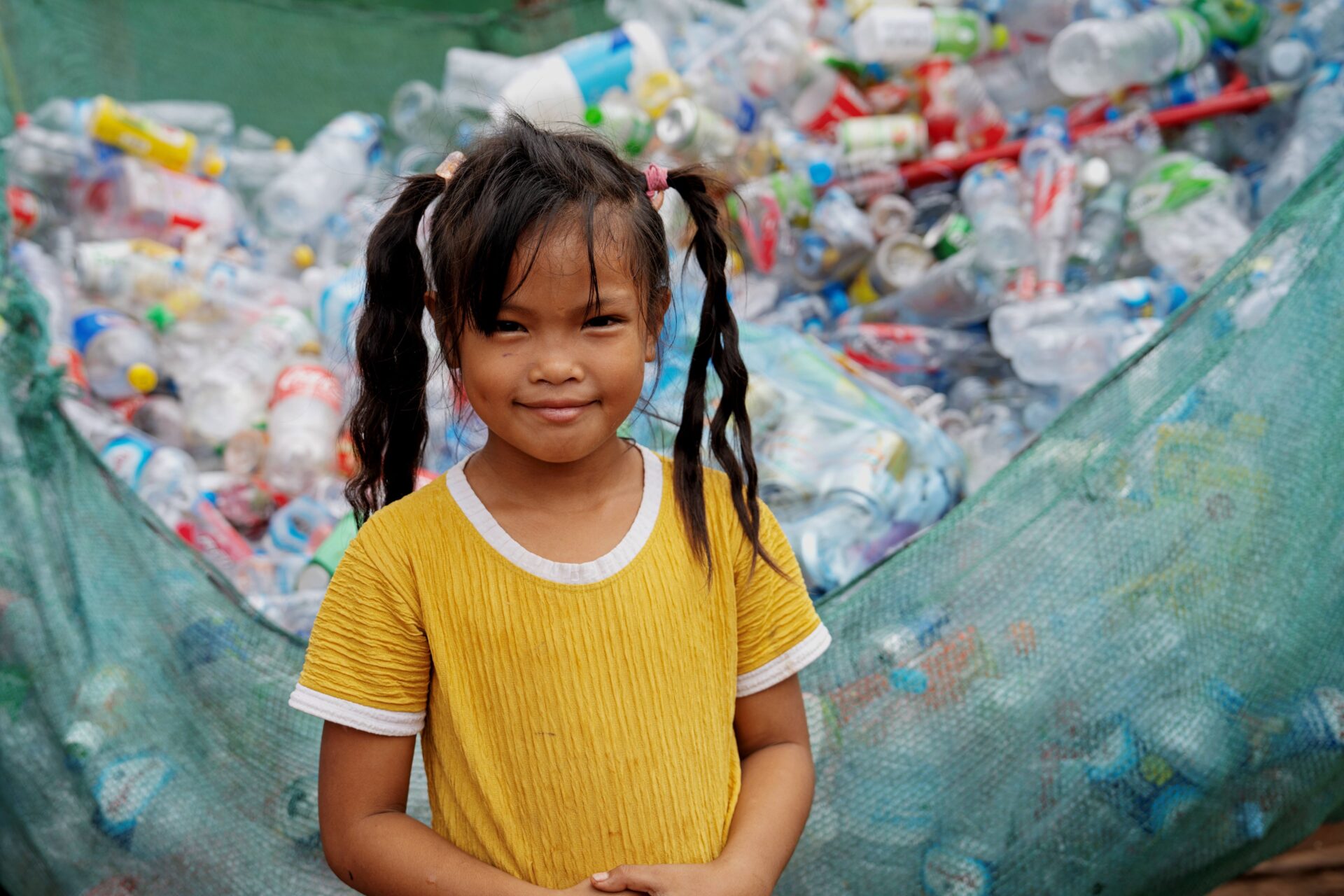 Pige i landsby i Laos